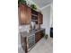 Stylish bar area featuring custom cabinets, a wine rack, and a sleek beverage cooler at 2891 S Rainbow Ave, Pahrump, NV 89048