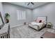Inviting bedroom with plush carpeting and ample natural light from shuttered windows at 2891 S Rainbow Ave, Pahrump, NV 89048