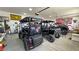 Garage featuring multiple recreational vehicles and patriotic decor at 2891 S Rainbow Ave, Pahrump, NV 89048