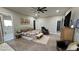 Spacious main bedroom with calming decor, large bed, and a comfortable sitting area at 2891 S Rainbow Ave, Pahrump, NV 89048