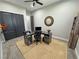 Cozy office space with modern wood desk, straw rug, and convenient cabinet at 2891 S Rainbow Ave, Pahrump, NV 89048