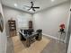 Bright office with modern wood desk, ceiling fan and lovely decorative shelving at 2891 S Rainbow Ave, Pahrump, NV 89048