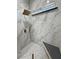 Modern walk-in shower with rainfall showerhead, accent tile, and built-in bench at 2891 S Rainbow Ave, Pahrump, NV 89048