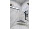 Stylish walk-in shower with marble-like tile, a niche, and a corner seat at 2891 S Rainbow Ave, Pahrump, NV 89048