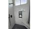Modern walk-in shower boasts black fixtures, niche, and sleek design at 2891 S Rainbow Ave, Pahrump, NV 89048