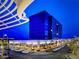 Modern building exterior with retail shopping, restaurants, and ample parking at 2925 Big Green Ln, Las Vegas, NV 89134