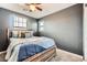 Bright bedroom with stylish bed, plush carpet, and ample natural light at 363 Silva Pl, Henderson, NV 89011