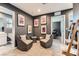 Decorated sitting room area with movie posters and reading chairs at 363 Silva Pl, Henderson, NV 89011