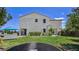 Lovely backyard with a hot tub, trampoline, and lush green lawn at 396 Blackstone River Ave, Las Vegas, NV 89148