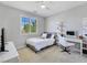 Bright bedroom with natural light, desk, vanity, and neutral décor at 396 Blackstone River Ave, Las Vegas, NV 89148