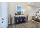 The foyer has neutral walls, a window with shutters, and modern decor at 396 Blackstone River Ave, Las Vegas, NV 89148