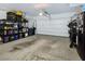Spacious garage with storage shelves and ample space for vehicles and other storage needs at 396 Blackstone River Ave, Las Vegas, NV 89148