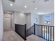 Upstairs hallway featuring natural light and railing at 396 Blackstone River Ave, Las Vegas, NV 89148