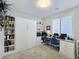 Well-lit home office features a built-in Murphy bed, custom shelving, and a functional workspace at 396 Blackstone River Ave, Las Vegas, NV 89148