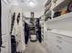 Walk-in closet with custom shelves, drawers, and hanging storage; a luxury for organization at 396 Blackstone River Ave, Las Vegas, NV 89148