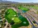 Expansive golf course view, showcasing lush greens, water features, and desert landscape at 42 Glade Water Dr, Henderson, NV 89052