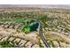 Panoramic view of a community with a golf course and serene ponds at 42 Glade Water Dr, Henderson, NV 89052