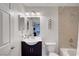 Bright bathroom featuring a modern vanity and a shower-tub combination with updated fixtures at 4200 S Valley View Blvd # 2009, Las Vegas, NV 89103