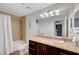 Bathroom with granite vanity, updated faucet, shower-tub, and decorative light fixture at 4200 S Valley View Blvd # 2009, Las Vegas, NV 89103