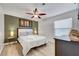 Comfortable bedroom with a modern style, ceiling fan, and a dresser for storage at 4200 S Valley View Blvd # 2009, Las Vegas, NV 89103
