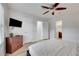 Bedroom featuring wood floors, a ceiling fan, and access to both the bathroom and closet at 4200 S Valley View Blvd # 2009, Las Vegas, NV 89103