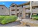 Condo building exterior with stairs leading to upper level units and well maintained landscaping at 4200 S Valley View Blvd # 2009, Las Vegas, NV 89103