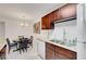 Modern kitchen with granite countertops, stainless steel sink, and white appliances at 4200 S Valley View Blvd # 2009, Las Vegas, NV 89103