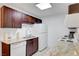 Well-lit kitchen featuring modern appliances, granite countertops, and sleek subway tile backsplash at 4200 S Valley View Blvd # 2009, Las Vegas, NV 89103