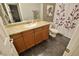 Bathroom featuring a single vanity, granite countertop, and shower with curtain at 4200 S Valley View Blvd # 3074, Las Vegas, NV 89103
