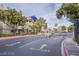 Community entrance with security gate and well-maintained landscaping at 4200 S Valley View Blvd # 3074, Las Vegas, NV 89103