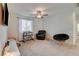 Bonus room with window for natural lighting, and ceiling fan at 4240 Spring Storm Ave, North Las Vegas, NV 89081