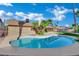 The backyard showcases a sparkling pool with mature landscaping and patio space at 4637 Balfour Dr, Las Vegas, NV 89121