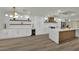 Renovated kitchen with a spacious island, modern appliances, and ample counter space for cooking and entertaining at 4637 Balfour Dr, Las Vegas, NV 89121