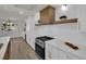 Kitchen features stone countertops, white subway tile backsplash, and stainless steel appliances at 4637 Balfour Dr, Las Vegas, NV 89121