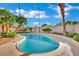 The backyard boasts a refreshing pool, mature palms, and plenty of sunshine at 4637 Balfour Dr, Las Vegas, NV 89121