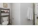 Bright bathroom with white fixtures, toilet and a rack, offering a functional design at 4976 Quiet Morning St, Las Vegas, NV 89122