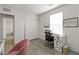 Bedroom with a large closet and natural light from the windows, great for studying or work at 4976 Quiet Morning St, Las Vegas, NV 89122