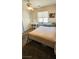 Cozy bedroom with a ceiling fan, a window and a closet for storage at 5045 Bayberry Crest St, North Las Vegas, NV 89031