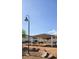 Inviting community park with covered seating area, perfect for relaxation and outdoor enjoyment at 5045 Bayberry Crest St, North Las Vegas, NV 89031