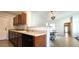 Bright kitchen transitions to dining area, offering ample counter space and storage at 5045 Bayberry Crest St, North Las Vegas, NV 89031