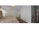 Cozy main bedroom with plush carpet, statement mirror, and decorative accents, creating a serene retreat at 5045 Bayberry Crest St, North Las Vegas, NV 89031