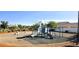 Community playground featuring a slide, climbing structure, and swings for outdoor fun at 5045 Bayberry Crest St, North Las Vegas, NV 89031