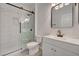 Bathroom features a glass shower, stylish mirror, and vanity with cabinet at 5155 W Tropicana Ave # 2095, Las Vegas, NV 89103