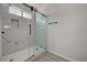 Modern bathroom featuring a glass shower with marble-look tile and matte black hardware at 5155 W Tropicana Ave # 2095, Las Vegas, NV 89103