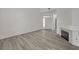 Open living area with fireplace and newly installed floors at 5155 W Tropicana Ave # 2095, Las Vegas, NV 89103