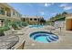 Community pool area with multiple pools, lounge chairs, and well-maintained landscaping at 5155 W Tropicana Ave # 2095, Las Vegas, NV 89103