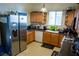 Functional kitchen with stainless steel refrigerator and ample countertop space at 5216 Loma Verde Ave, Las Vegas, NV 89108