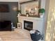 Cozy living room features a marble fireplace and modern finishes at 5474 S Maryland Pkwy, Las Vegas, NV 89119