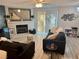 Cozy living room features a marble fireplace and bright lighting at 5474 S Maryland Pkwy, Las Vegas, NV 89119