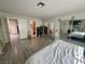 Spacious main bedroom with mirrored closet doors and en-suite bathroom offers ample space and convenience at 5474 S Maryland Pkwy, Las Vegas, NV 89119